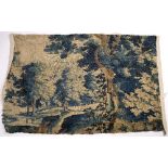 AN ANTIQUE VERDURE TAPESTRY depicting a wooded path, 144cm x 94cm