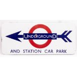 AN OLD ENAMEL UNDERGROUND AND STATION CARPARK SIGN 62.5cm x 27cm