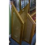 AN OAK TRIPTYCH PICTURE OR MIRROR FRAME together with two further triangular frames of similar size,
