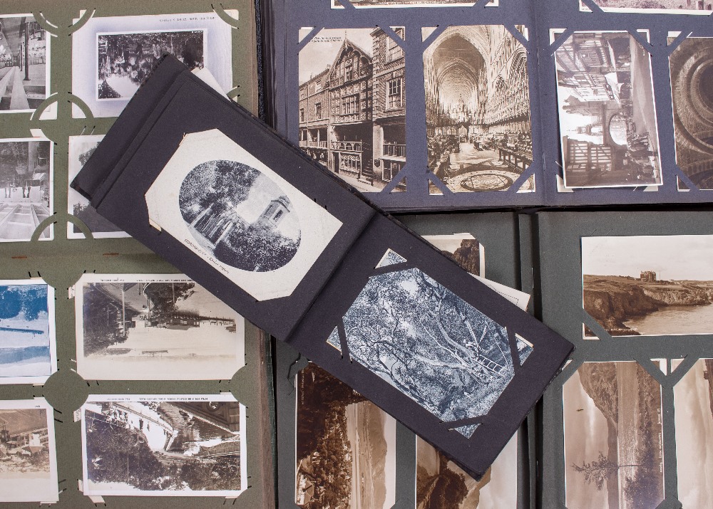 FOUR VINTAGE ALBUMS OF POSTCARDS to include topographical mosaics, historical houses, landscapes