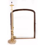 AN OVERMANTLE MIRROR with a parcel gilt lamp stand, the mirror 104cm x 125cm, the lamp stand 122cm