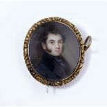 A 19TH CENTURY MINIATURE OVAL SHOULDER LENGTH PORTRAIT of a young gentleman, unsigned, set within