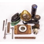 A SMALL GROUP OF HAND TOOLS a set of kitchen scales, an old iron, two hydrometers, an aneroid