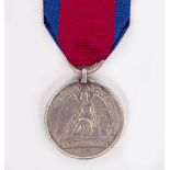 A WORN MEDAL inscribed Waterloo June 18th 1815 with partially erased name to the edge Corporal