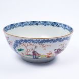 A Chinese Mandarin porcelain bowl late 18th/early 19th Century decorated with figures in a garden