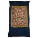 A Tibetan Thangka late 19th/early 20th Century painted with Buddha Shakyamuni and Buddha field of 35