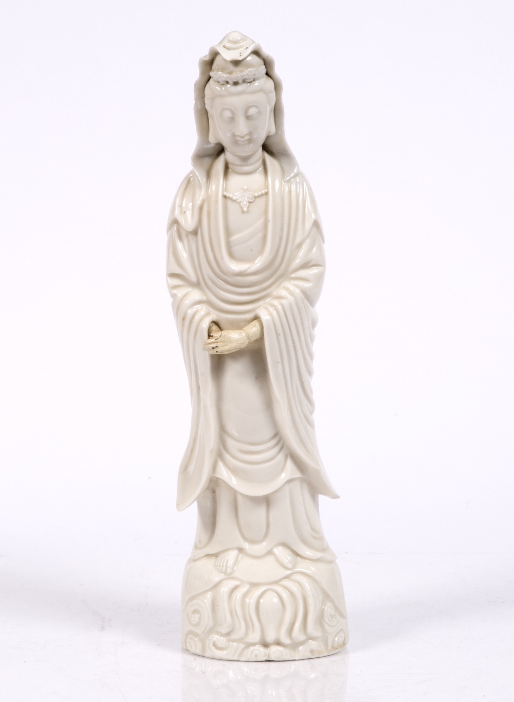 A Chinese Dehua standing figure of Guanyin 19th Century 40cm high