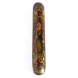 A Persian Qajar Papier Mache Pen Box (Qalamdan) hand painted with a central portrait, animals and