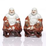 A pair of Chinese seated model Pu-Tai late 19th/20th Century each on an open work base, 13cm