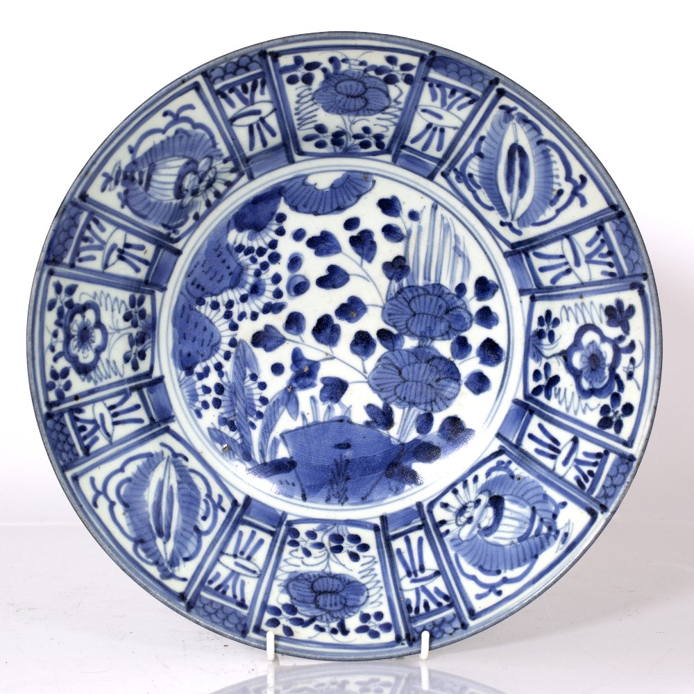 A Chinese Kraak dish circa 1700 with a traditional panel and foliate designs, 31cm