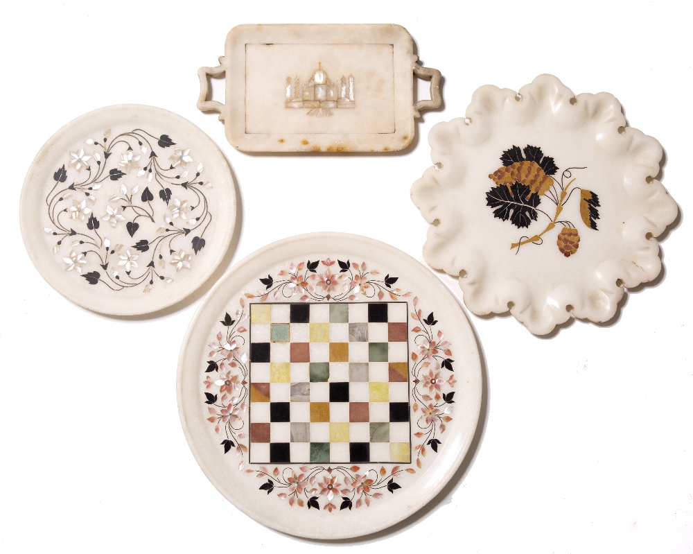 Four Indian Pietra Dura marble trays each inlaid with stone and mother of pearl depicting flowers