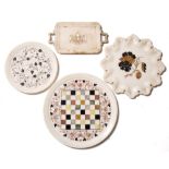 Four Indian Pietra Dura marble trays each inlaid with stone and mother of pearl depicting flowers