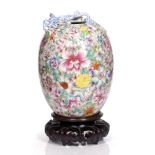 A Chinese famille rose enamel vase early 20th Century with mille-fleur decoration and dragon