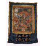 A Tibetan Thangka 19th Century painted with Mahakala on a black ground, 41cm x 33cm