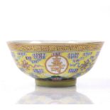 A Chinese yellow enamel longevity bowl decorated in coloured enamels,with four gilt roundels bearing