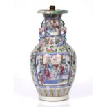 A Chinese Canton vase circa 1870/90 with painted enamel panel of an interior scene with various