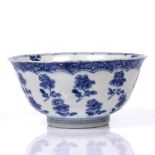 A Chinese blue and white porcelain bowl Kangxi (1662-1722) having a panels of flowers within a