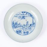 A Chinese blue and white dish 18th/19th Century painted with a scholar in a garden, Chenghua mark,