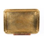 A Qajar engraved rectangular brass tray (Qalamzani) with central medallion - story of Rostam and