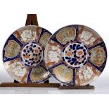 A pair of Japanese Imari chargers circa 1900 each with panels of phoenix, blossom and bamboo, 45.