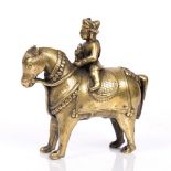 Sultanate of Western Deccan 17/18th Century a brass standing horse and rider, 20cm across