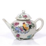 A Chinese famille rose teapot early 19th Century painted with a chicken and flowering peonies, 16cm