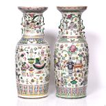 Two similar Chinese Canton vases late 19th Century painted with enamels with auspicious subjects,