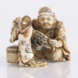 A Japanese ivory okimono late Meiji depicting a scene from the Tongue-cut sparrow tale, a man