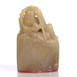 A Chinese jade seal 19th/20th Century in the form of Shou Lao, 9cm high