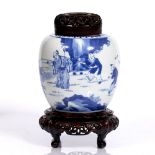 A Chinese blue and white ginger jar 18th/19th Century with boys playing in a garden, with hardwood