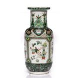 A Chinese famille rose rouleau vase 19th Century painted with panels of auspicious subjects and