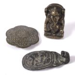 A Chinese buckle a bronze Ganesh and an Indian buckle
