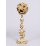 A Chinese Canton ivory concentric ball circa 1900 delicately pierced and carved with a mass of