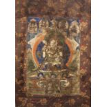 A Tibetan Thangka Vaishravana seated on a lotus throne, surrounded by smaller gods, 64cm x 44cm (