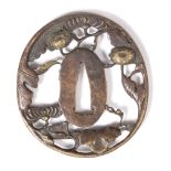 A Japanese bronze tsuba flowers, 7.2cm