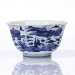 A Chinese blue and white octagonal bowl late Ming painted with scholars in a rocky landscape, 11.5cm