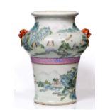 A Chinese Hu shaped vase 19th Century with mock animal mask and ring handles, the body decorated