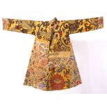 A Tibetan government official's robe circa 1930 silk brocade with designs of lotus flowers and