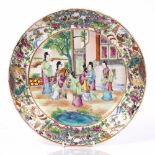 A Chinese Canton plate 19th Century having an enamelled scene with a group of courtiers, 25cm