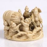 A Japanese ivory okimono of Tawara Todo Meiji period with samurai and helpers carrying the dodogie