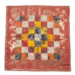 A Tibetan altar cloth 17th/19th Century a plaque with chequer board design composed of Chinese