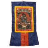 Two Tibetan Thangkas 20th Century each painted with Mahakala, 46cm x 30cm and 65cm x 42cm