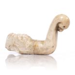 A Mughal carved marble cloth hook 18th Century In the form of a parrot's head, 23cm across