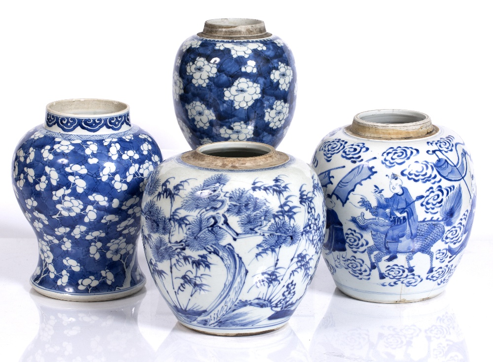 Three Chinese blue and white ginger jars 19th Century variously decorated including prunus, and a