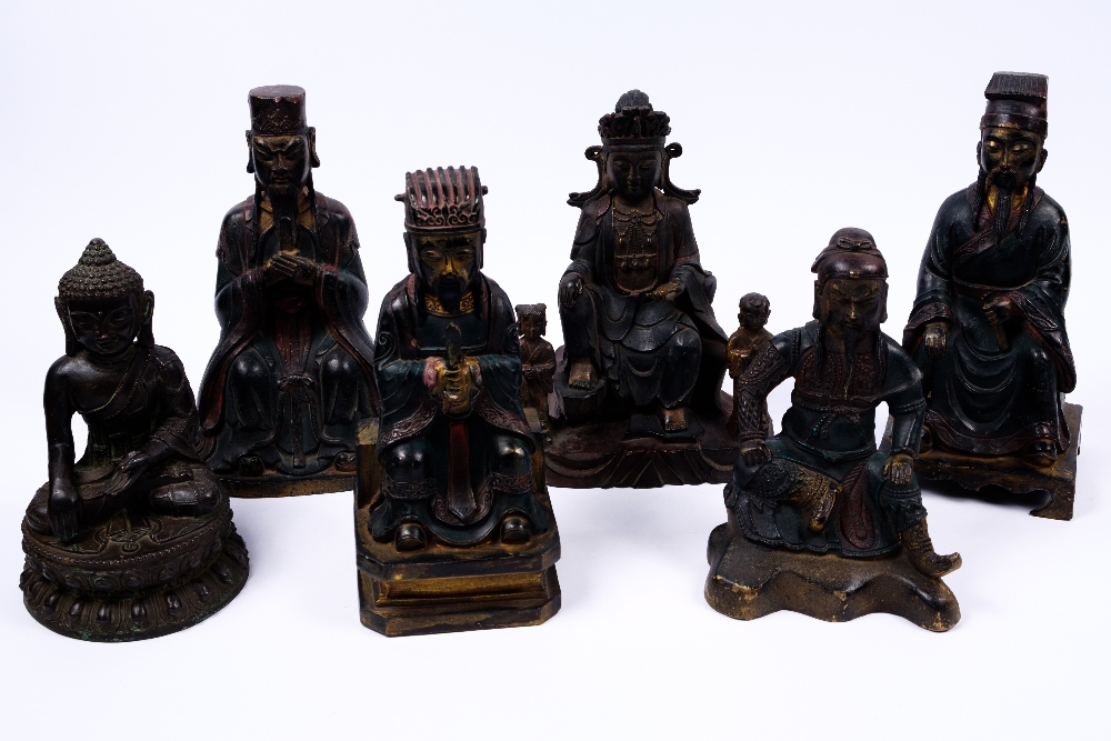 A Chinese bronze seated buddha in the 17th Century style 21cm high, two bronze Confucius figures,