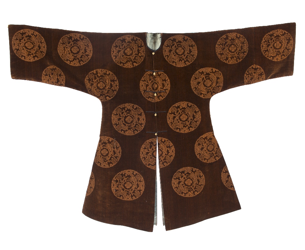 A Chinese voided velvet informal robe 19th Century of dark sienna ground and with gilt metal
