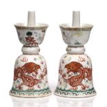 A pair of Chinese porcelain inverted candle holders 19th Century painted with dragons and flaming