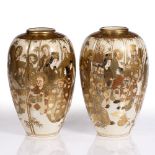 A pair of Japanese Satsuma oviform vases Meiji period decorated all around with a gathering of