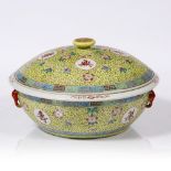 A Chinese yellow ground bowl and cover circa 1930 with Guangxu six character mark overpainted in