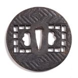 A Japanese iron tsuba by Ajiro, window, 8cm